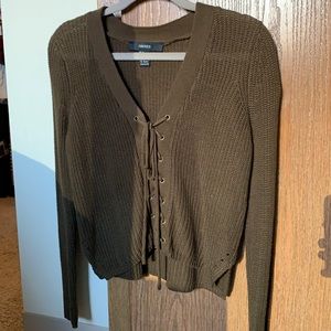 Lace-up green sweater